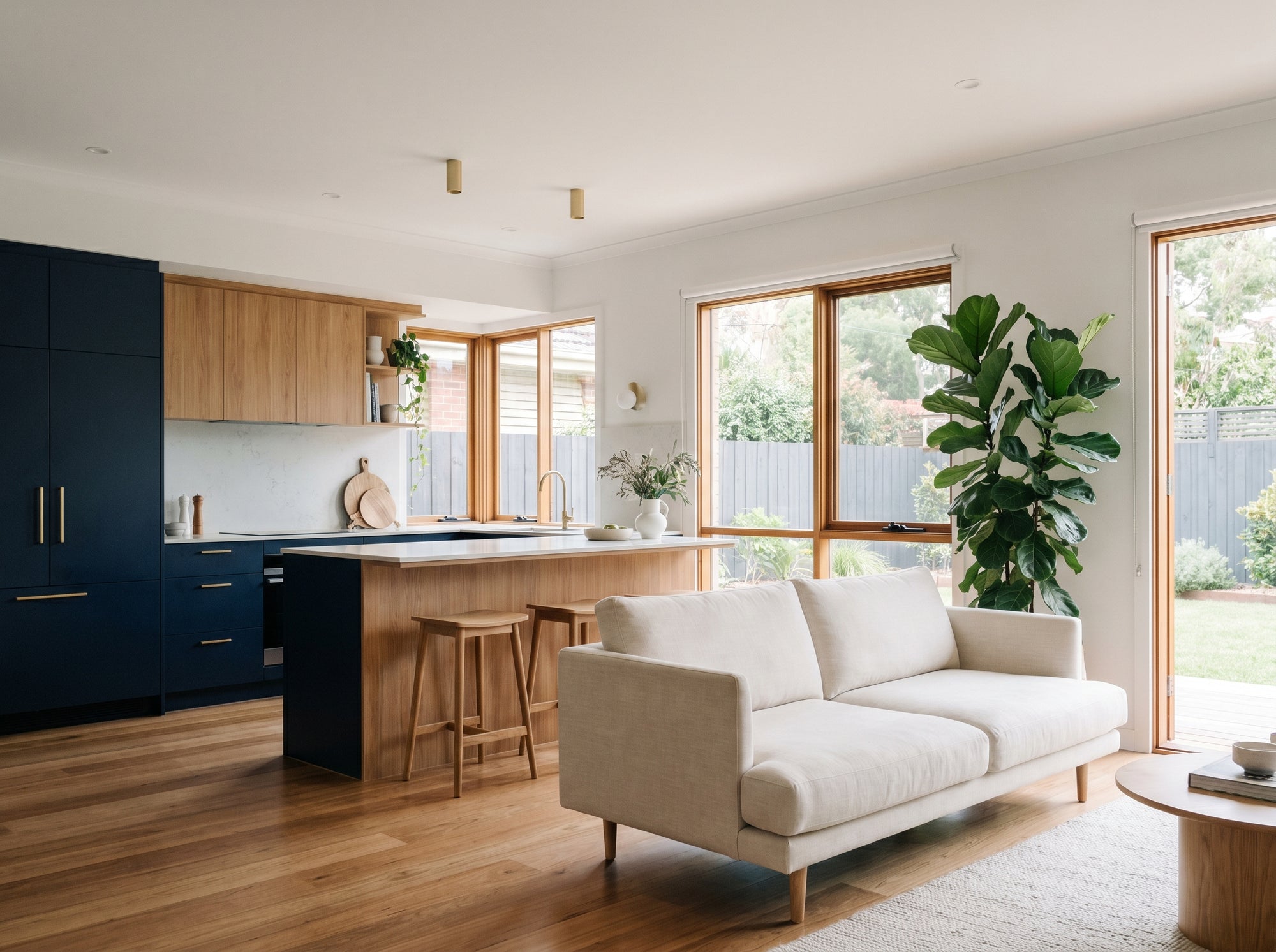 Renovated open-plan Australian home — kitchen flowing to living